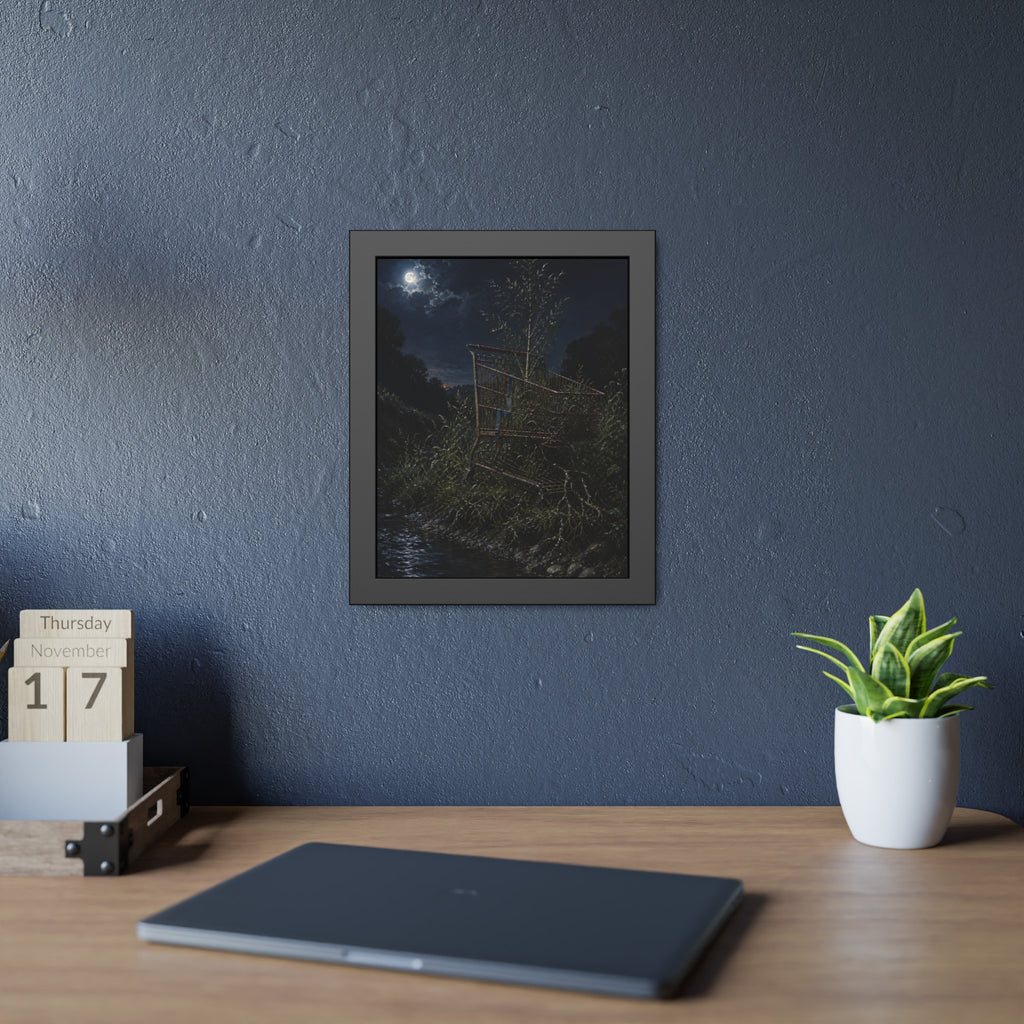 A shopping cart in creekside weeds with a sapling growing up through it. The Cart Grown Through by Garabaggio, framed fine art print hanging in a room.