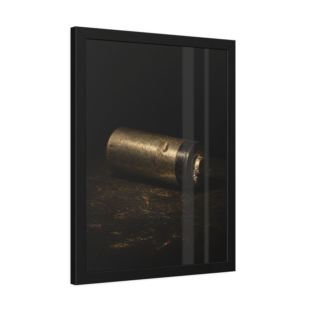 A corroded AA battery lying on a dark gritty surface in a single beam. The First Exhaustion by Garabaggio, framed fine art print hanging in a room.