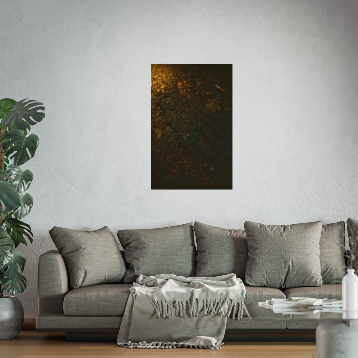 Wet mud and pressed oak leaves with a green scrap barely showing. The Reliquary of Mud and Leaf by Garabaggio, fine art print hanging in a room.