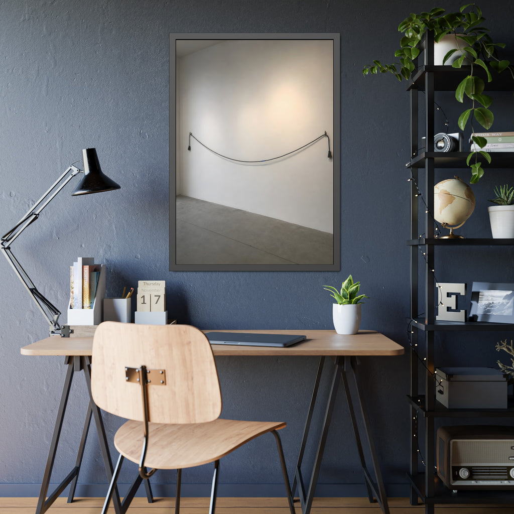 An extension cord hung in a long slack curve across a bare white wall. The Unplugged Line by Garabaggio, framed fine art print hanging in a room.