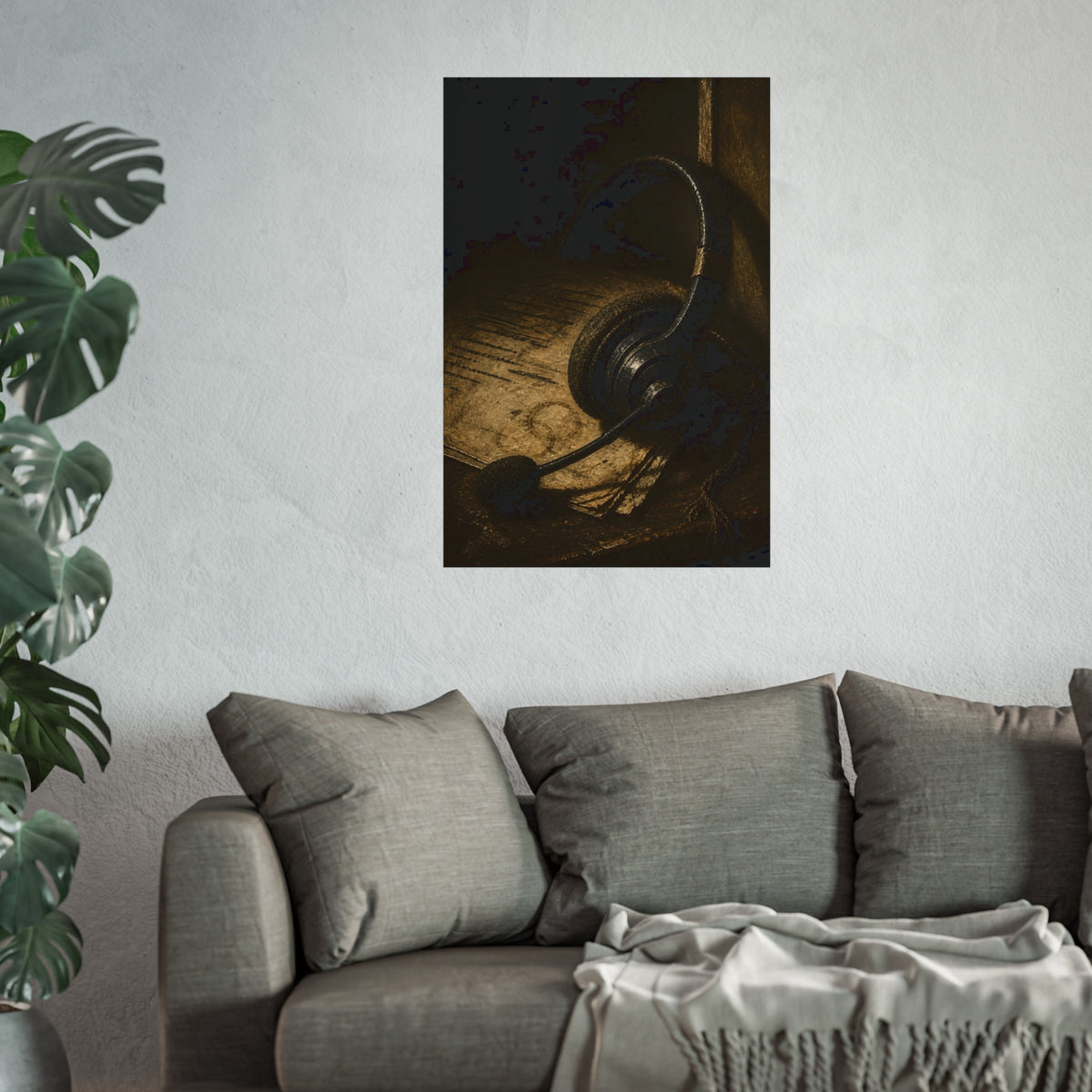 A worn headset resting on a printed script page with coffee rings. The Script Beside the Mouthpiece by Garabaggio, fine art print hanging in a room.