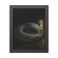 Deflated pool float ring on wet ground, lit from one side in the dark. After the Last Swim by Garabaggio, framed fine art print, 11″ x 14″.