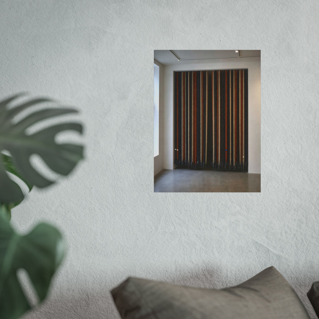 Hundreds of extension cords hung floor to ceiling across a bright white room. The Cord Curtain by Garabaggio, fine art print hanging in a room.