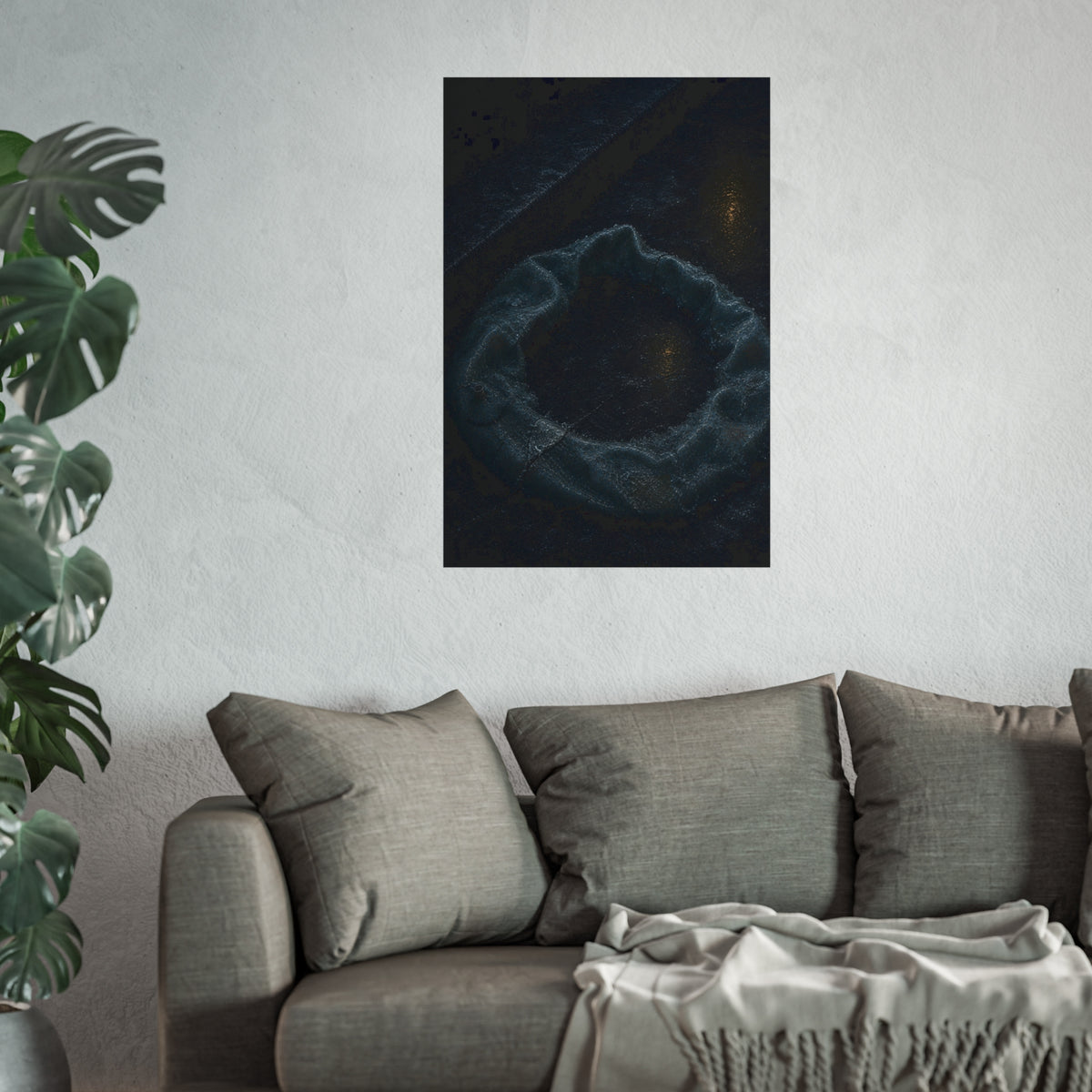 A deflated ring float collapsed on wet pavement under distant amber light. The Freezing of the Smile by Garabaggio, fine art print hanging in a room.