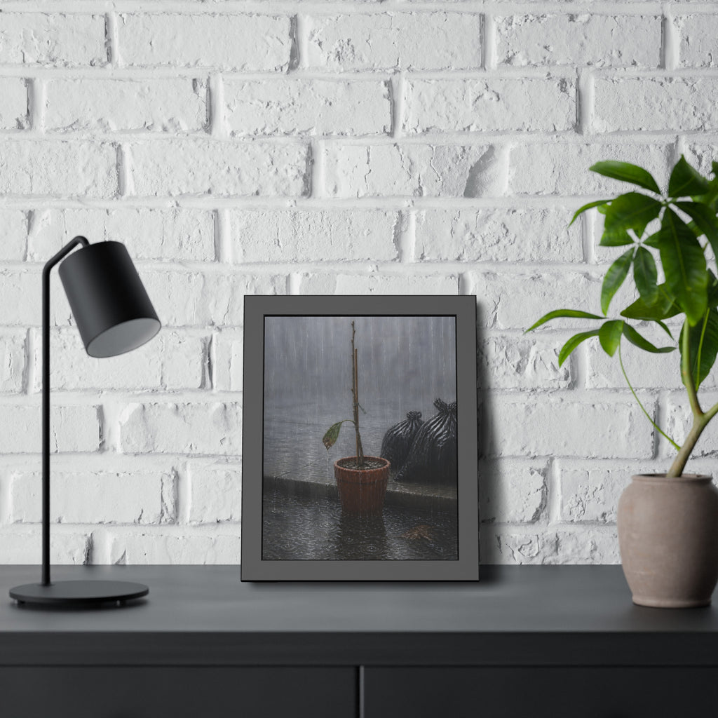 A bare stick in a clay pot on a curb in heavy rain beside trash bags. The Second Rain by Garabaggio, framed fine art print hanging in a room.