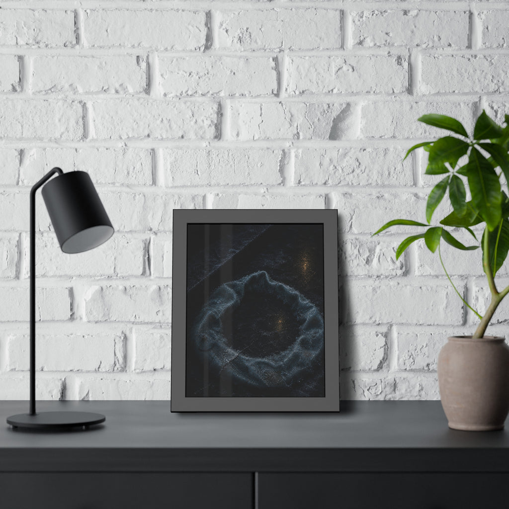 A deflated ring float collapsed on wet pavement under distant amber light. The Freezing of the Smile by Garabaggio, framed fine art print hanging in a room.
