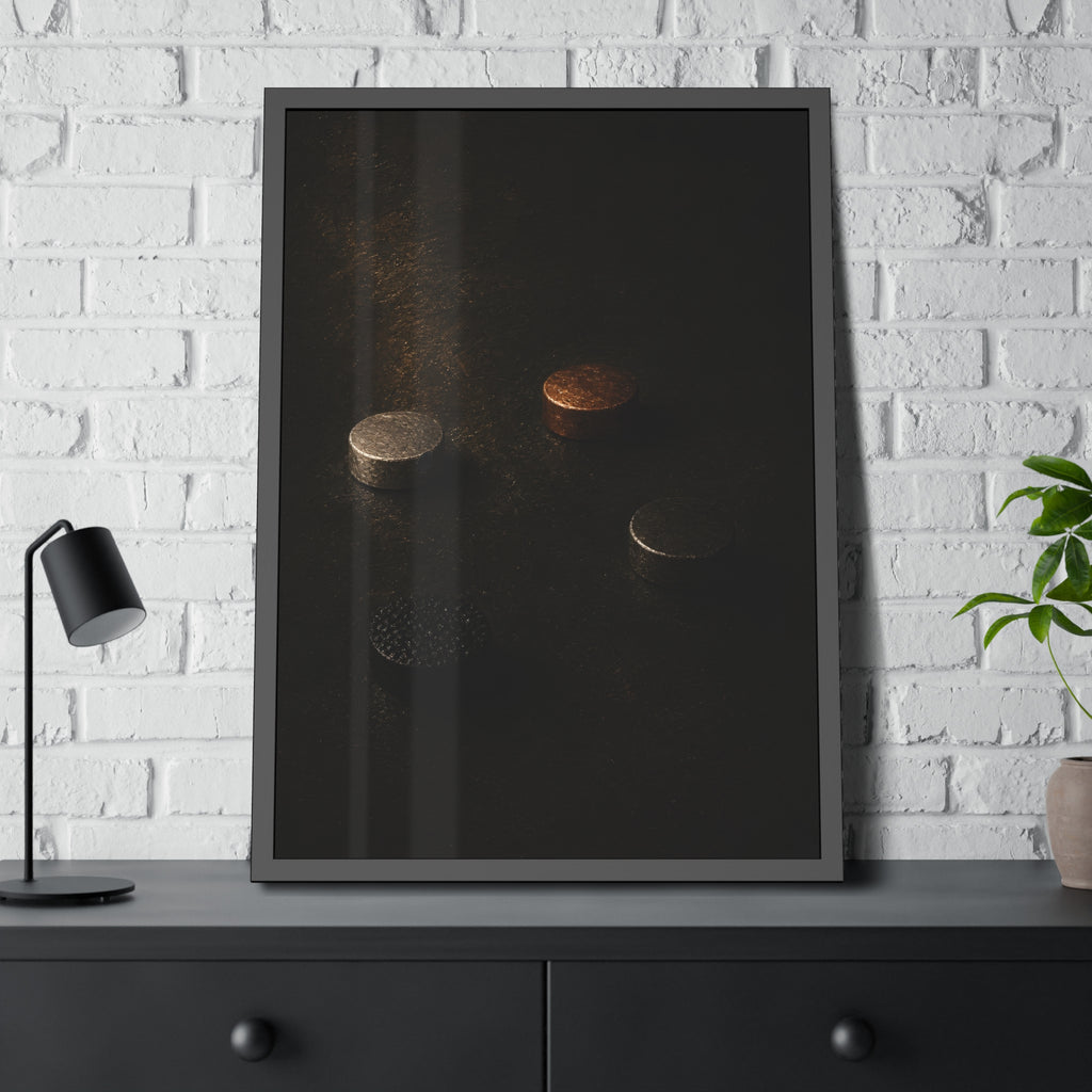 Four small metal discs on a dark scuffed surface in a narrow beam of light. Metals After the Song by Garabaggio, framed fine art print hanging in a room.