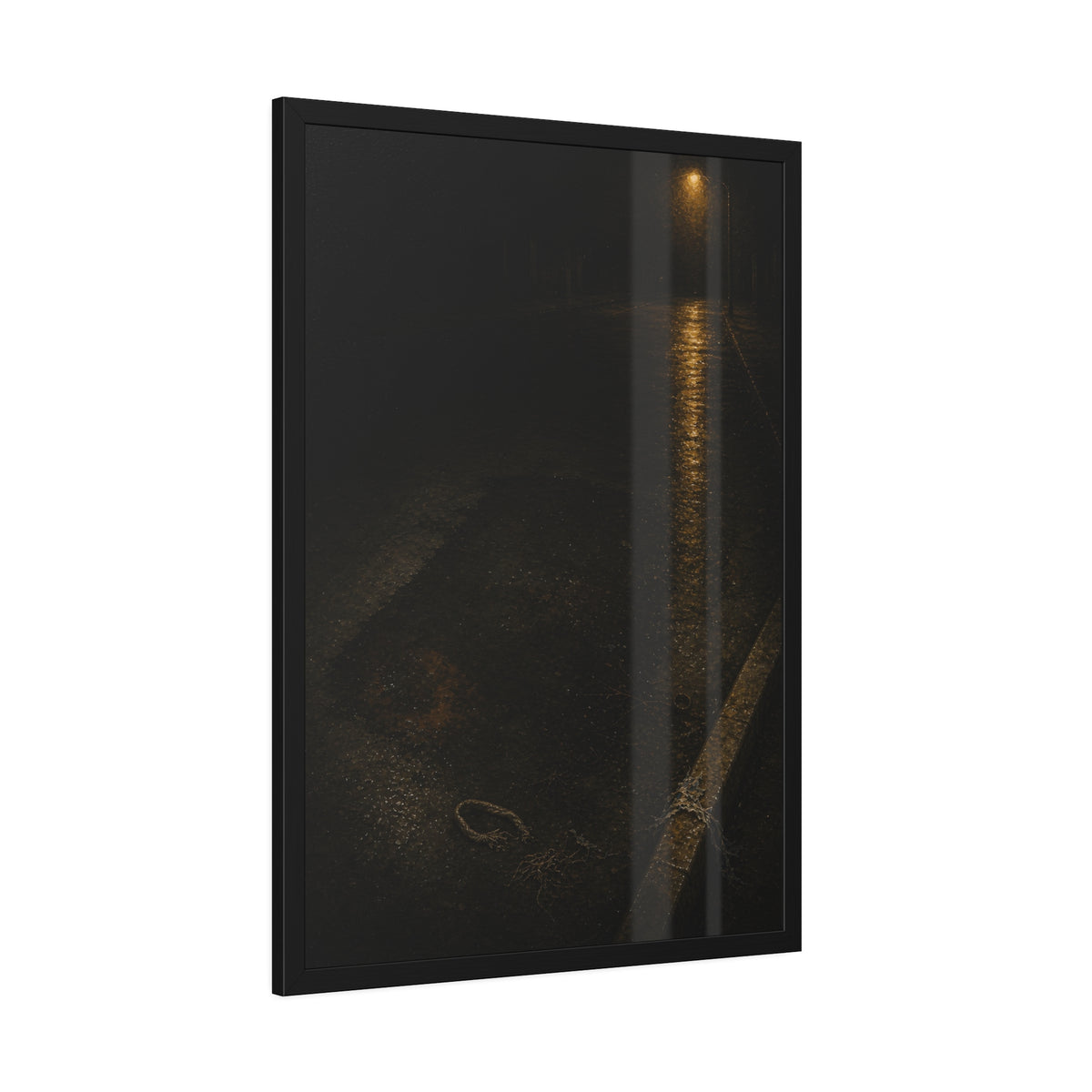 A rectangular stain on wet asphalt where something lay, under a streetlamp. The Stain After Removal by Garabaggio, framed fine art print hanging in a room.