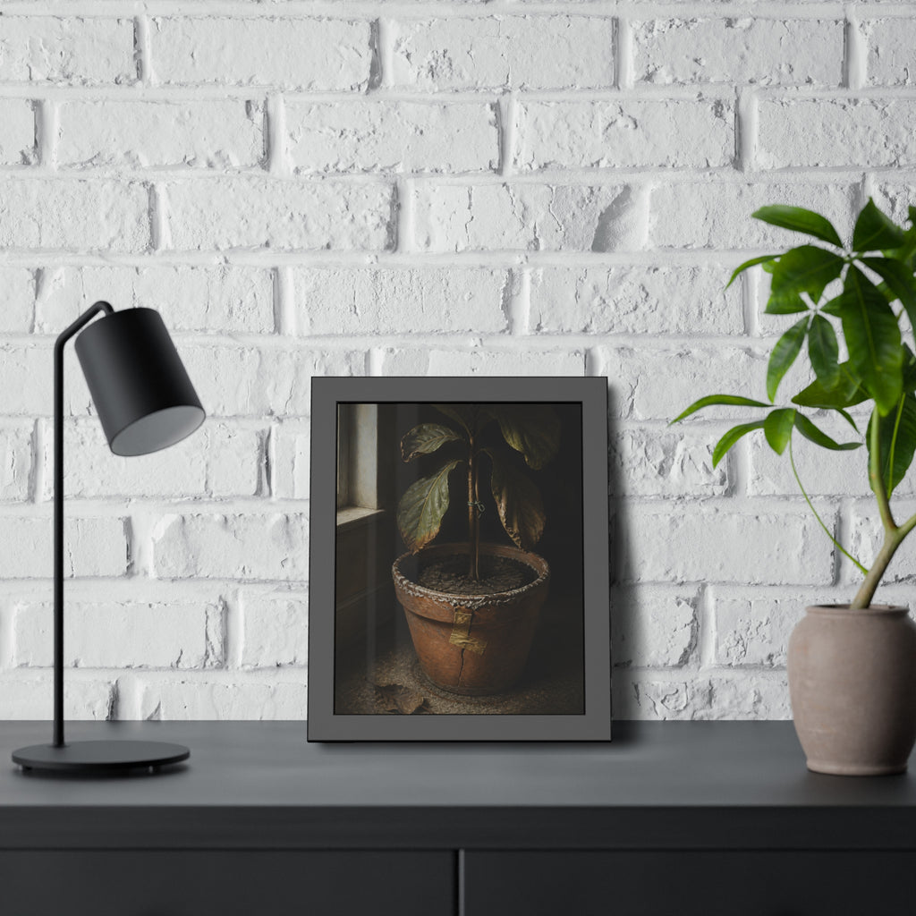 A drooping potted plant in a cracked terracotta pot beside a window. The Missed Watering by Garabaggio, framed fine art print hanging in a room.