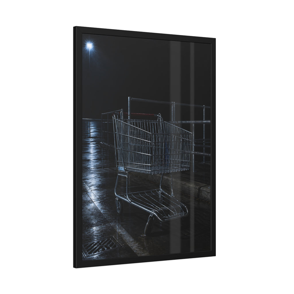 A shopping cart beside its corral on wet asphalt under a lot light. The Cart at the Corral by Garabaggio, framed fine art print hanging in a room.