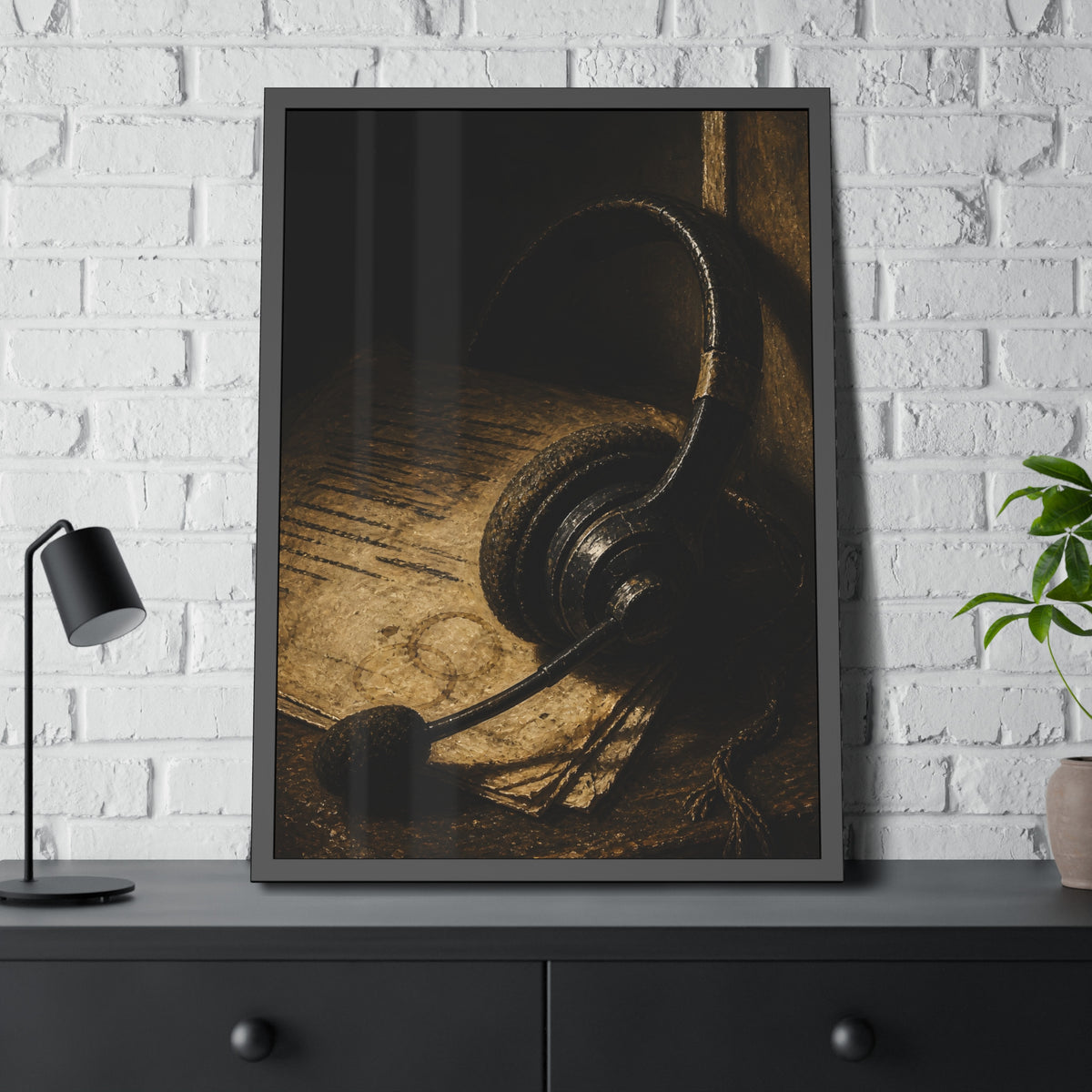 A worn headset resting on a printed script page with coffee rings. The Script Beside the Mouthpiece by Garabaggio, framed fine art print hanging in a room.
