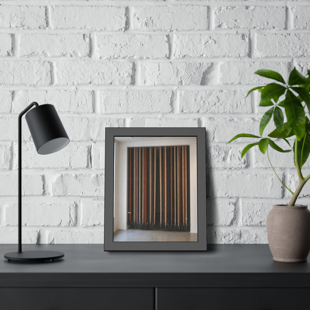 Hundreds of extension cords hung floor to ceiling across a bright white room. The Cord Curtain by Garabaggio, framed fine art print hanging in a room.