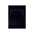 An empty swing set in near darkness with one seat twisted. The Fourth Hour: The Floodlights Cut by Garabaggio, fine art print, 12″ x 16″.