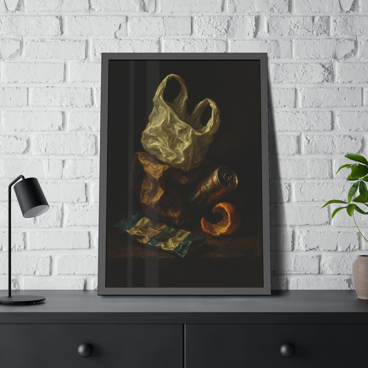 A plastic bag, crushed can and orange peel on a dim table. Still Life with Orange Peel and Resignation by Garabaggio, framed fine art print hanging in a room.