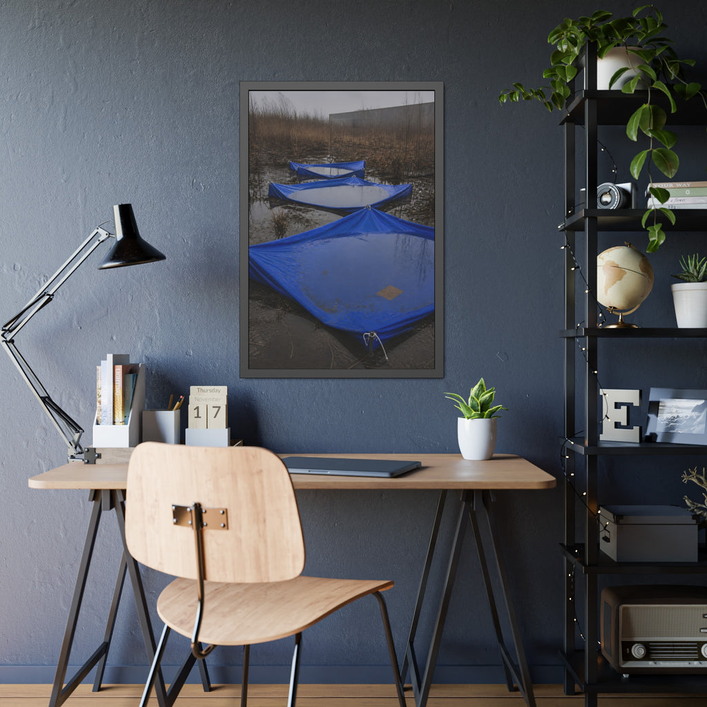 Three blue tarps holding pooled rainwater in a weedy vacant lot. Flooded in the Vacant Lot by Garabaggio, framed fine art print hanging in a room.