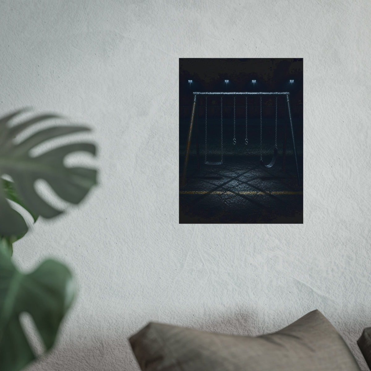 An empty swing set at night, chains still, floodlights far behind it. The Tenth Hour: The Chains Settle by Garabaggio, fine art print hanging in a room.