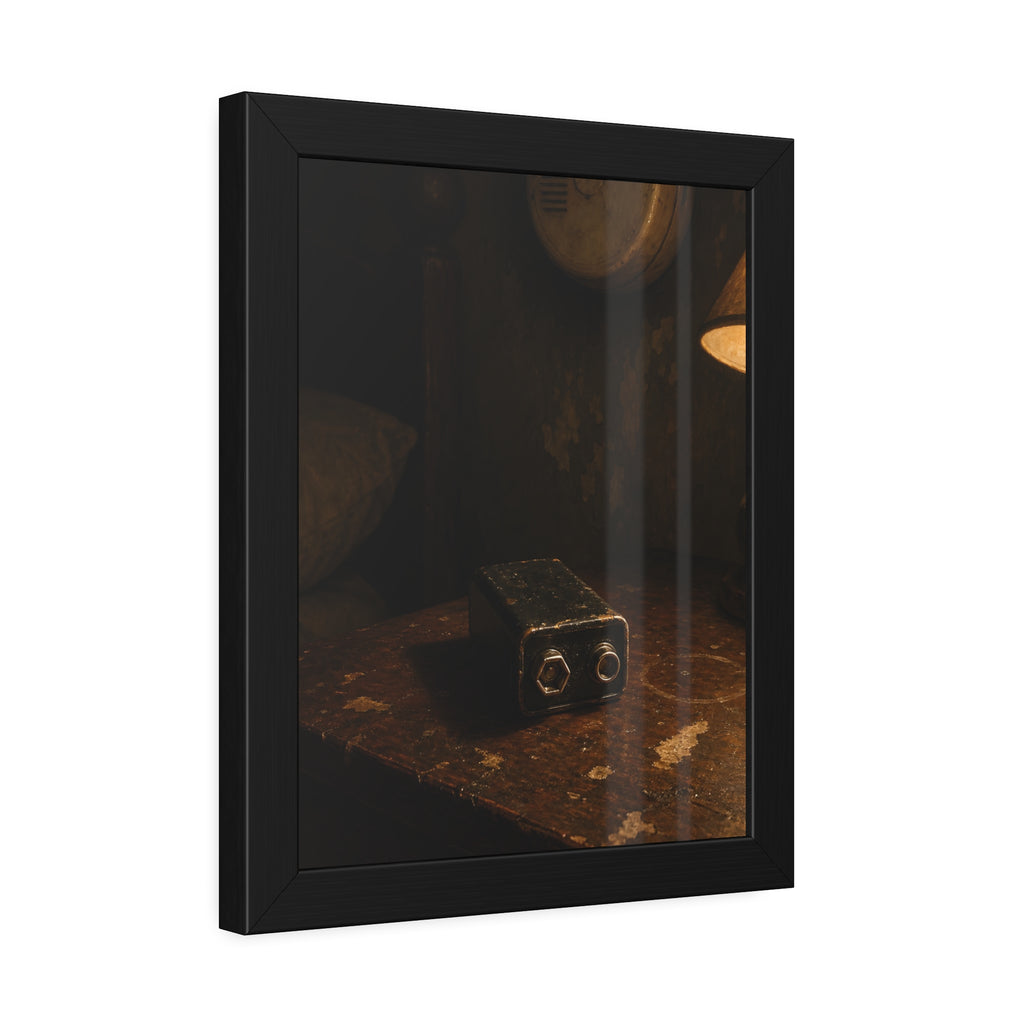 A nine volt battery on a nightstand below a wall smoke detector. The Battery Laid Below by Garabaggio, framed fine art print hanging in a room.