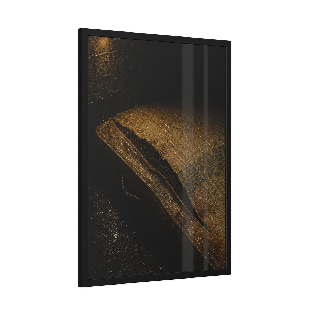 A mattress with its seam split open, lit warm against a dark wall. The Opening of the Ticking by Garabaggio, framed fine art print hanging in a room.