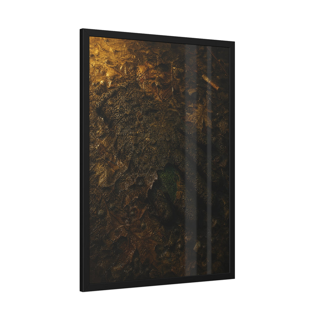 Wet mud and pressed oak leaves with a green scrap barely showing. The Reliquary of Mud and Leaf by Garabaggio, framed fine art print hanging in a room.