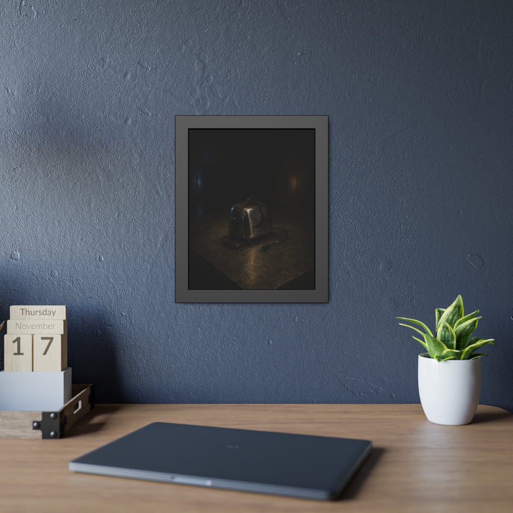 A scorched chrome toaster alone on a metal counter in a dark room. The Cooling on Steel by Garabaggio, framed fine art print hanging in a room.