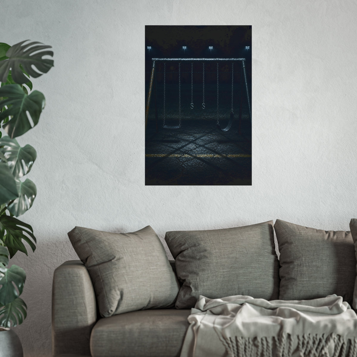 An empty swing set at night, chains still, floodlights far behind it. The Tenth Hour: The Chains Settle by Garabaggio, fine art print hanging in a room.