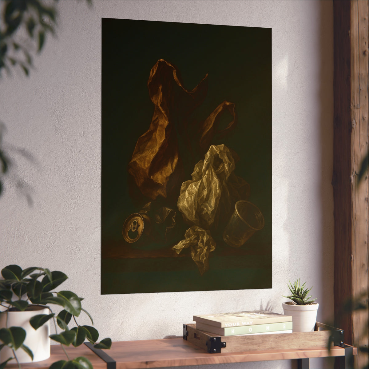 A plastic bag and crumpled paper beside a crushed can and clear cup. The Two Penitents by Garabaggio, fine art print hanging in a room.