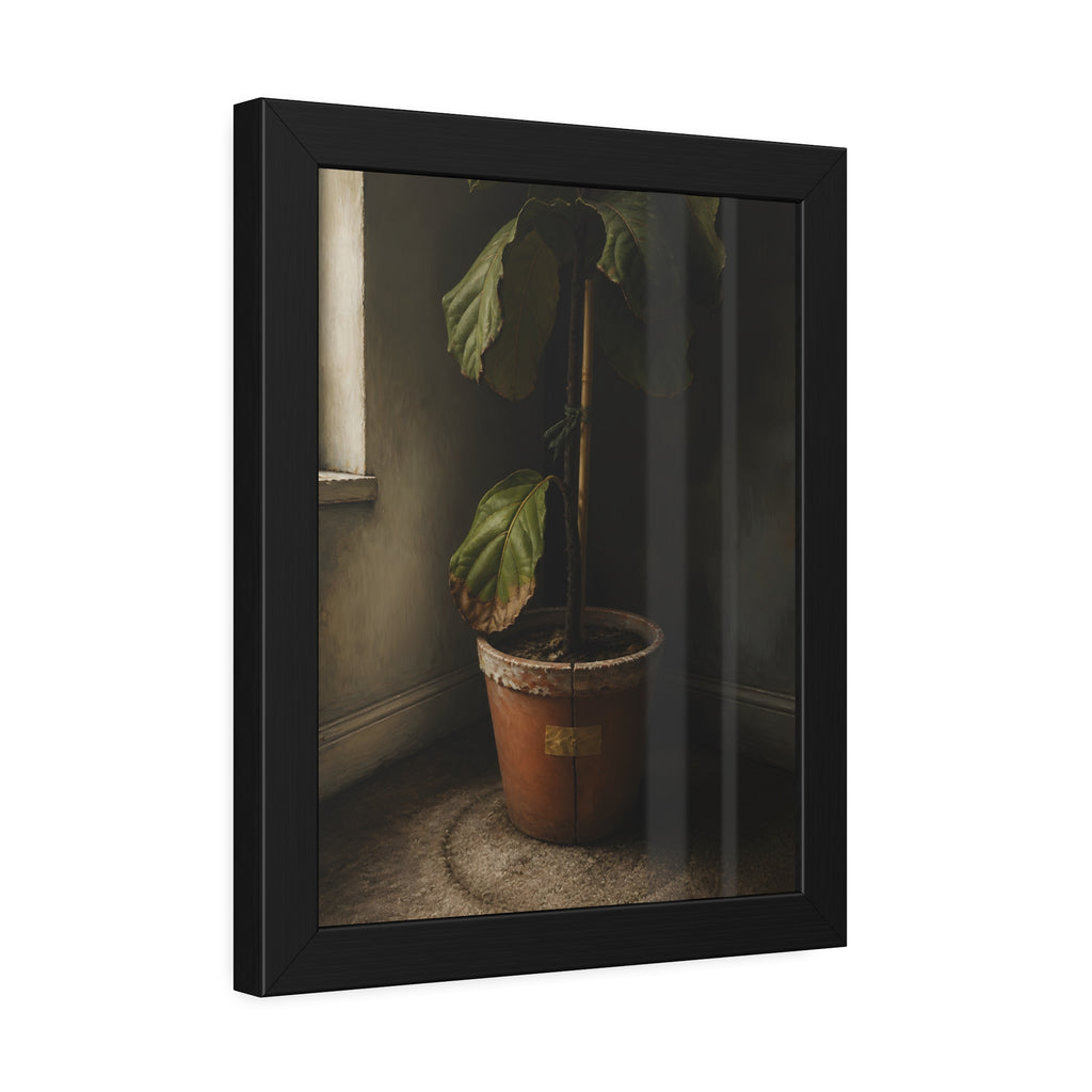 A leafy potted fig staked to a cane in a taped clay pot beside a window. The Corner by the Window by Garabaggio, framed fine art print hanging in a room.