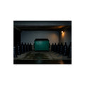 A green dumpster flanked by rows of black garbage bags under a lamp. Night Watch of the Loading Dock by Garabaggio, fine art print, 16″ x 12″.
