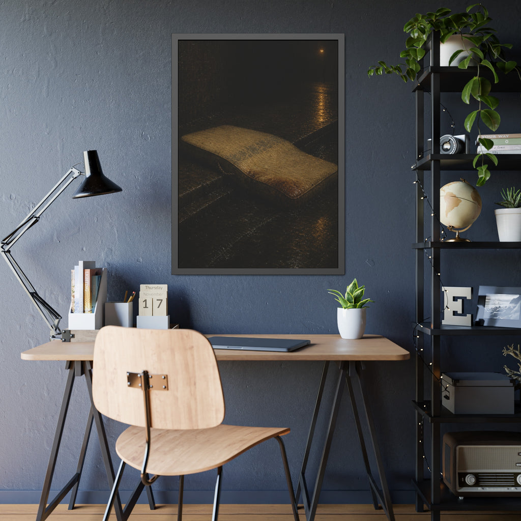 A sodden mattress slumped off a curb on wet pavement under a street lamp. The Collapse into the Gutter by Garabaggio, framed fine art print hanging in a room.