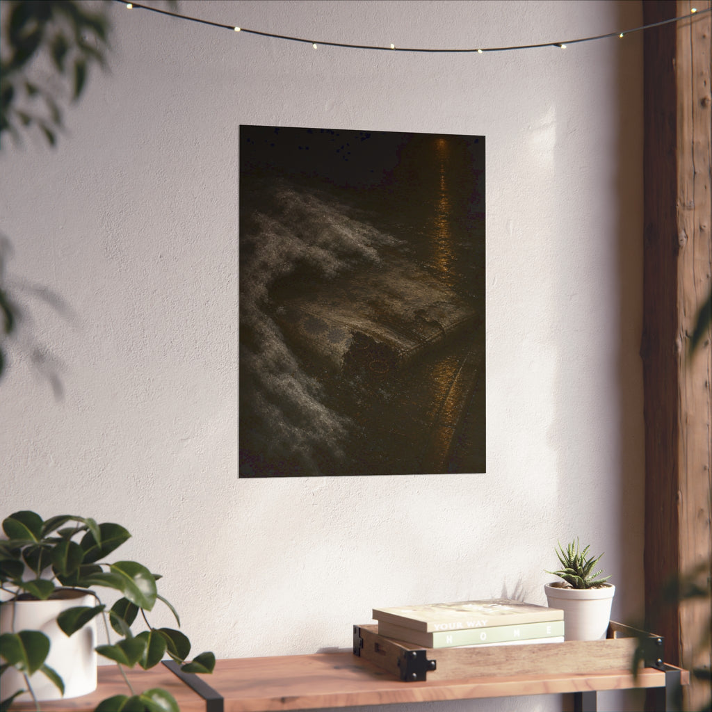 A soaked mattress in melting snow at the curb beside a wet street. The Thaw by Garabaggio, fine art print hanging in a room.