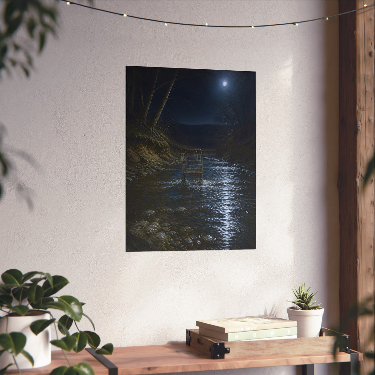 A shopping cart standing in a moonlit creek between dark trees. The Fording of the Creek by Garabaggio, fine art print hanging in a room.