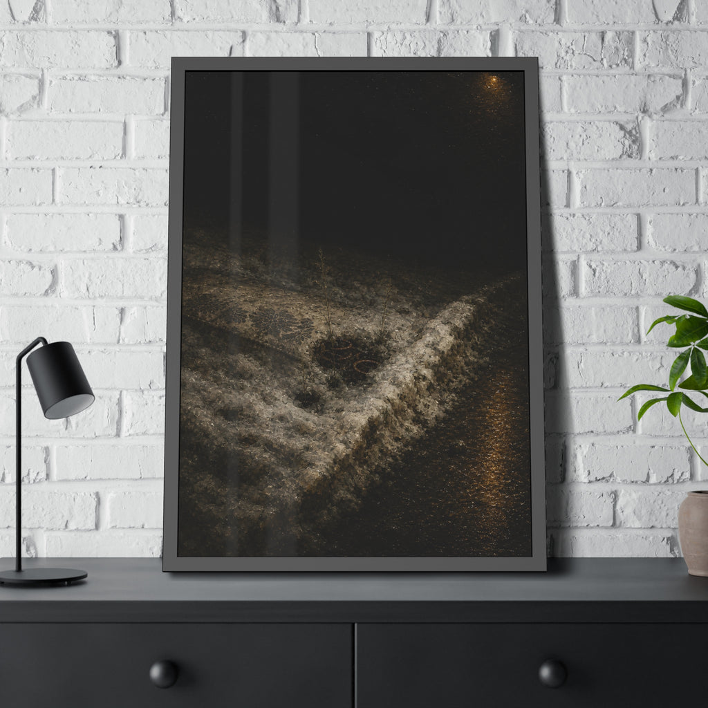 A discarded mattress half buried in snow, a distant streetlight behind. The White Burial by Garabaggio, framed fine art print hanging in a room.