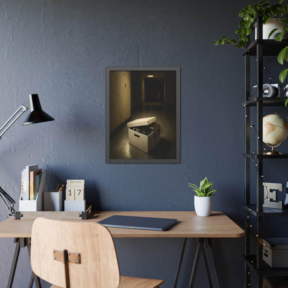 An open box of desk items on the floor of a dim office hallway. The Box of Personal Effects by Garabaggio, framed fine art print hanging in a room.