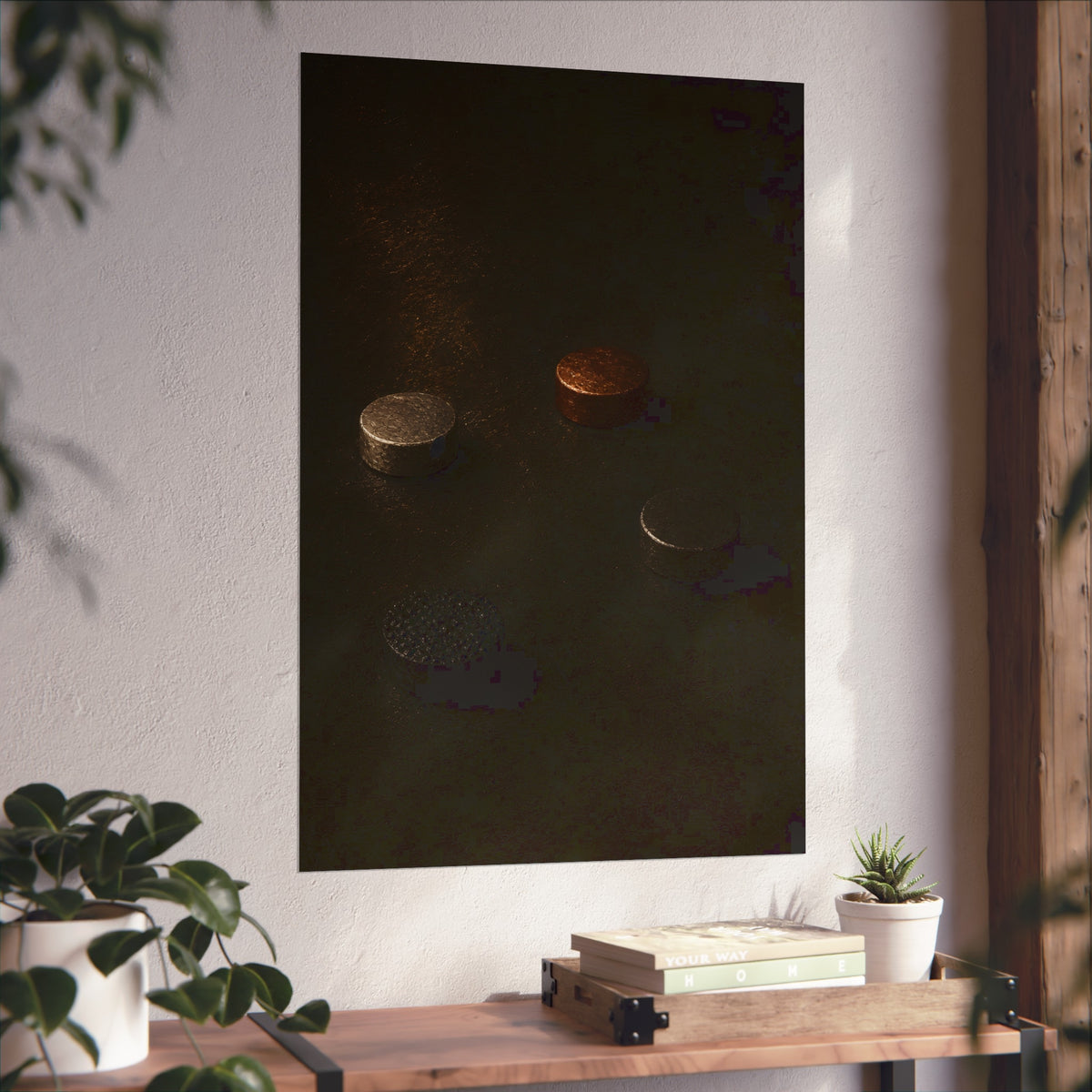 Four small metal discs on a dark scuffed surface in a narrow beam of light. Metals After the Song by Garabaggio, fine art print hanging in a room.