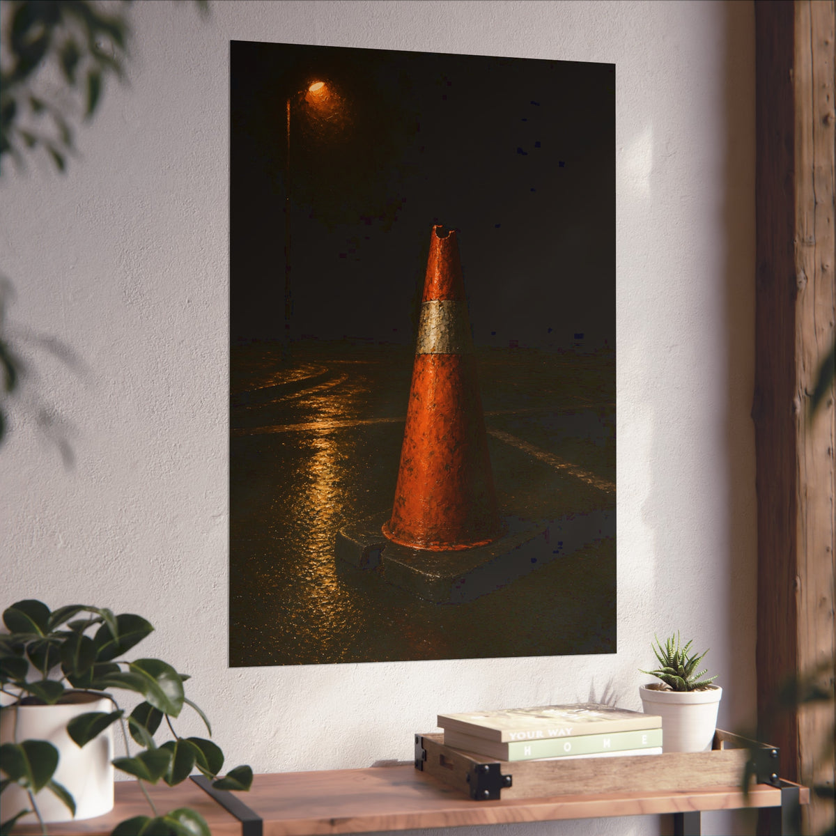 A battered orange traffic cone on wet asphalt under a street lamp. The Warning Without Danger by Garabaggio, fine art print hanging in a room.