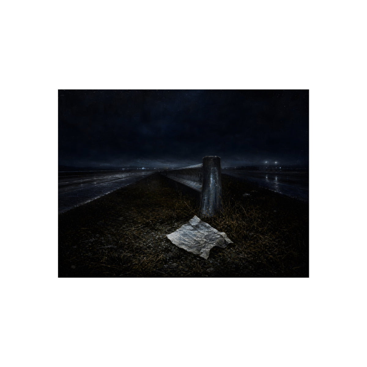 A sheet of paper on a grassy highway median beside a concrete post at night. The Resume on the Median by Garabaggio, fine art print, 24″ x 18″.
