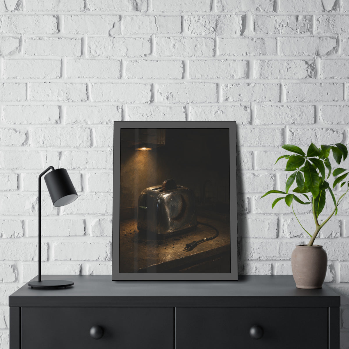 Scorched toaster with burnt toast on a counter under a cabinet light. Breakfast Interrupted by Garabaggio, framed fine art print hanging in a room.