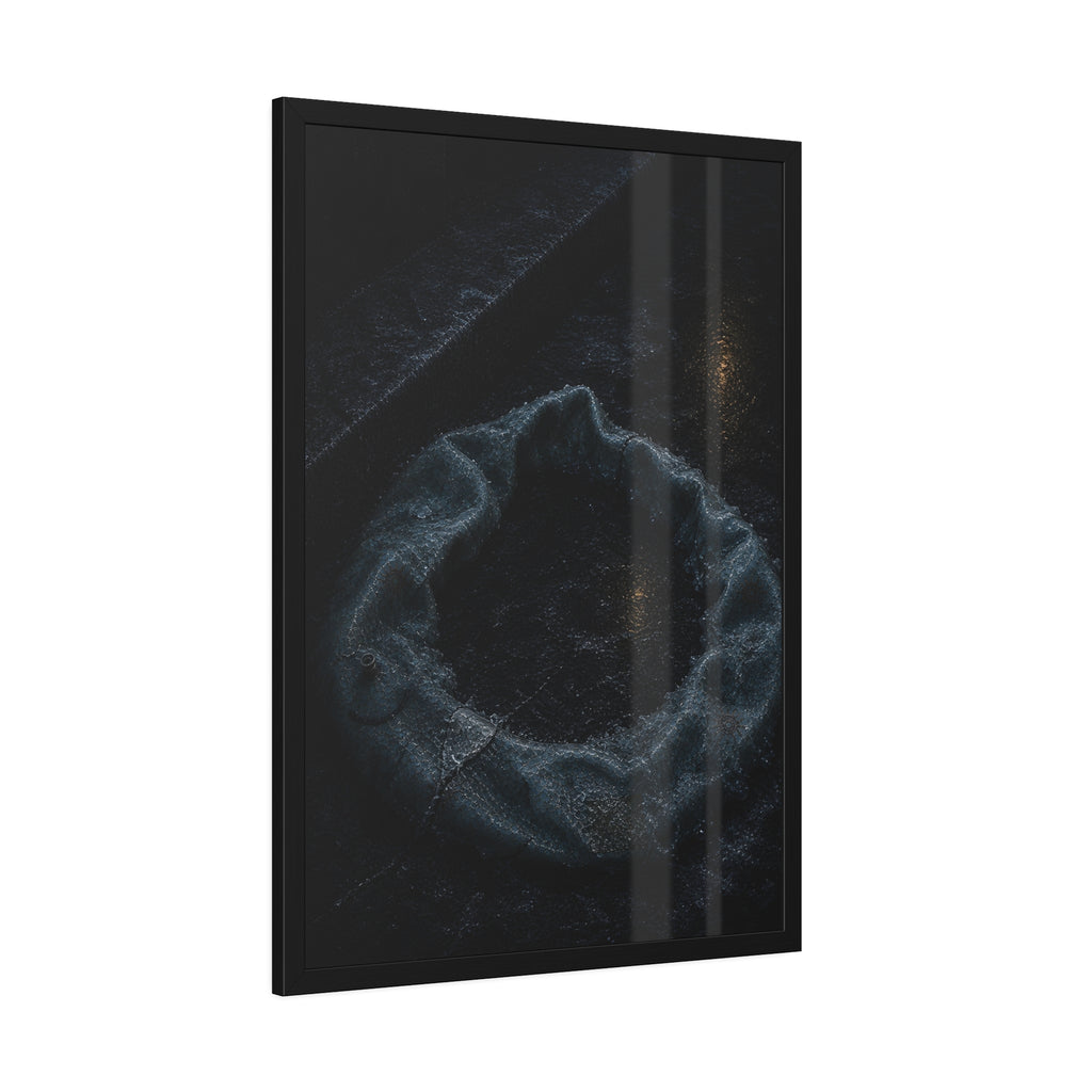 A deflated ring float collapsed on wet pavement under distant amber light. The Freezing of the Smile by Garabaggio, framed fine art print hanging in a room.