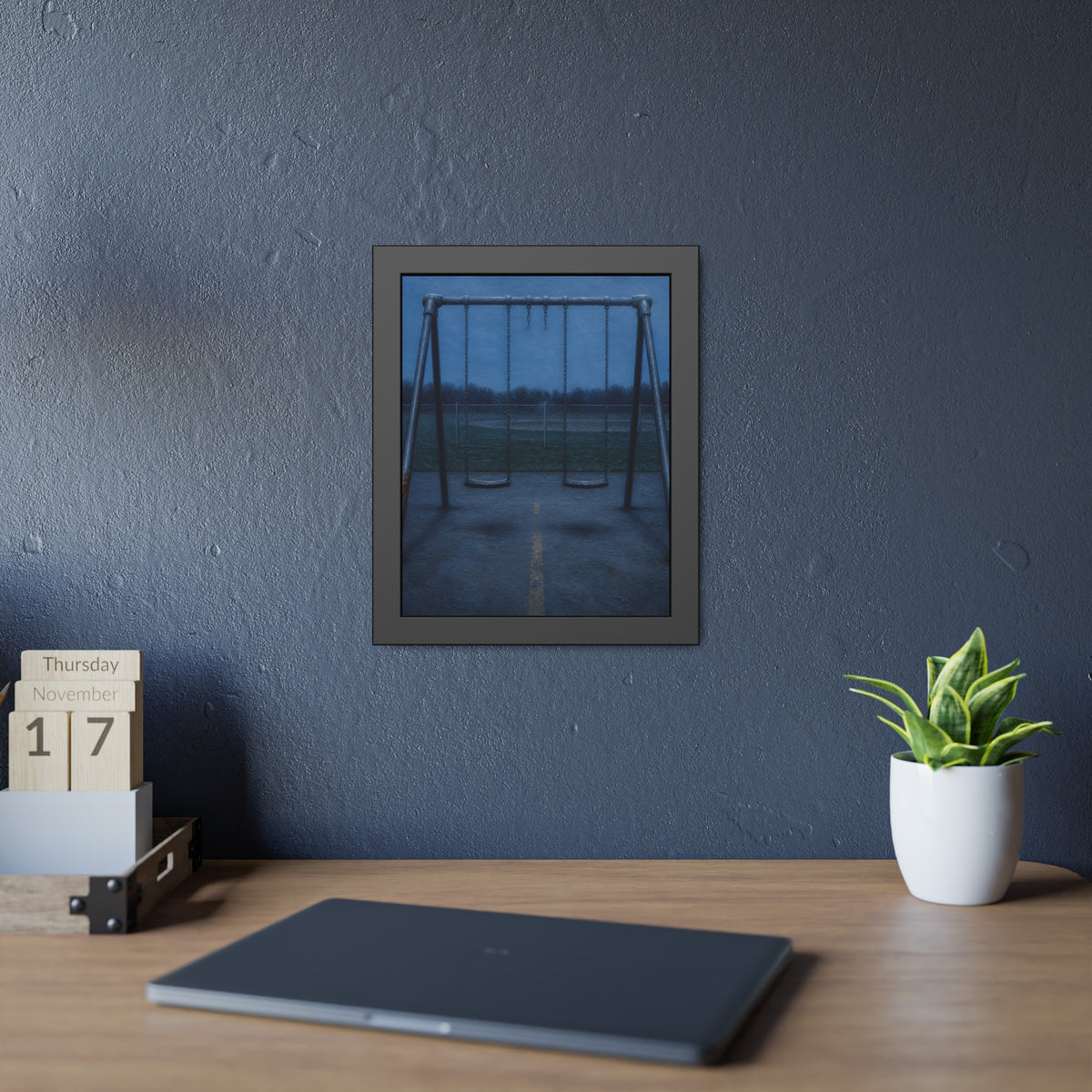 A swing set at dusk with two seats hanging straight. The Sixth Hour: The Seat Hanging Straight by Garabaggio, framed fine art print hanging in a room.