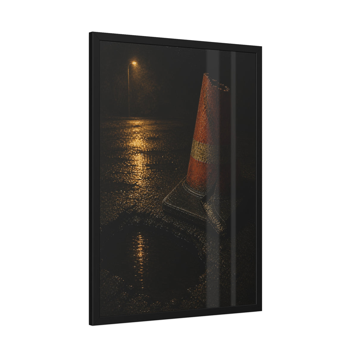A traffic cone beside a water filled pothole reflecting a street lamp. The Sentinel of the Pothole by Garabaggio, framed fine art print hanging in a room.