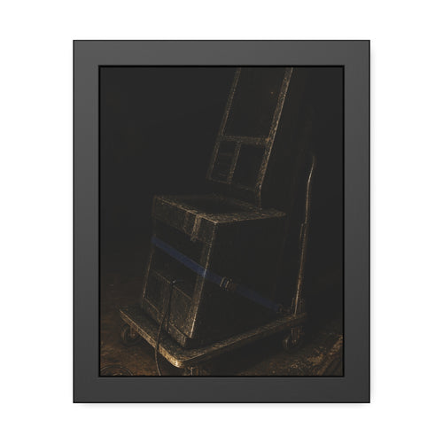 A self checkout unit strapped to a hand truck beside a caged lamp. The Removal of the Machine by Garabaggio, framed fine art print, 11″ x 14″.