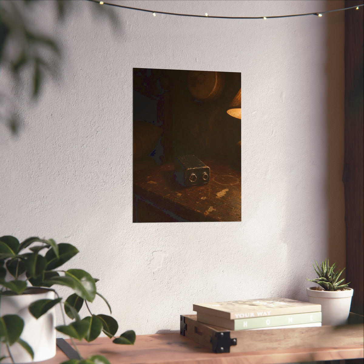 A nine volt battery on a nightstand below a wall smoke detector. The Battery Laid Below by Garabaggio, fine art print hanging in a room.