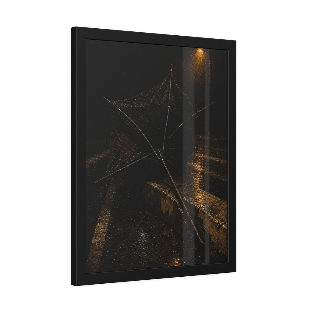 A broken umbrella inside out on a wet curb under a street lamp. The Inversion at the Median by Garabaggio, framed fine art print hanging in a room.
