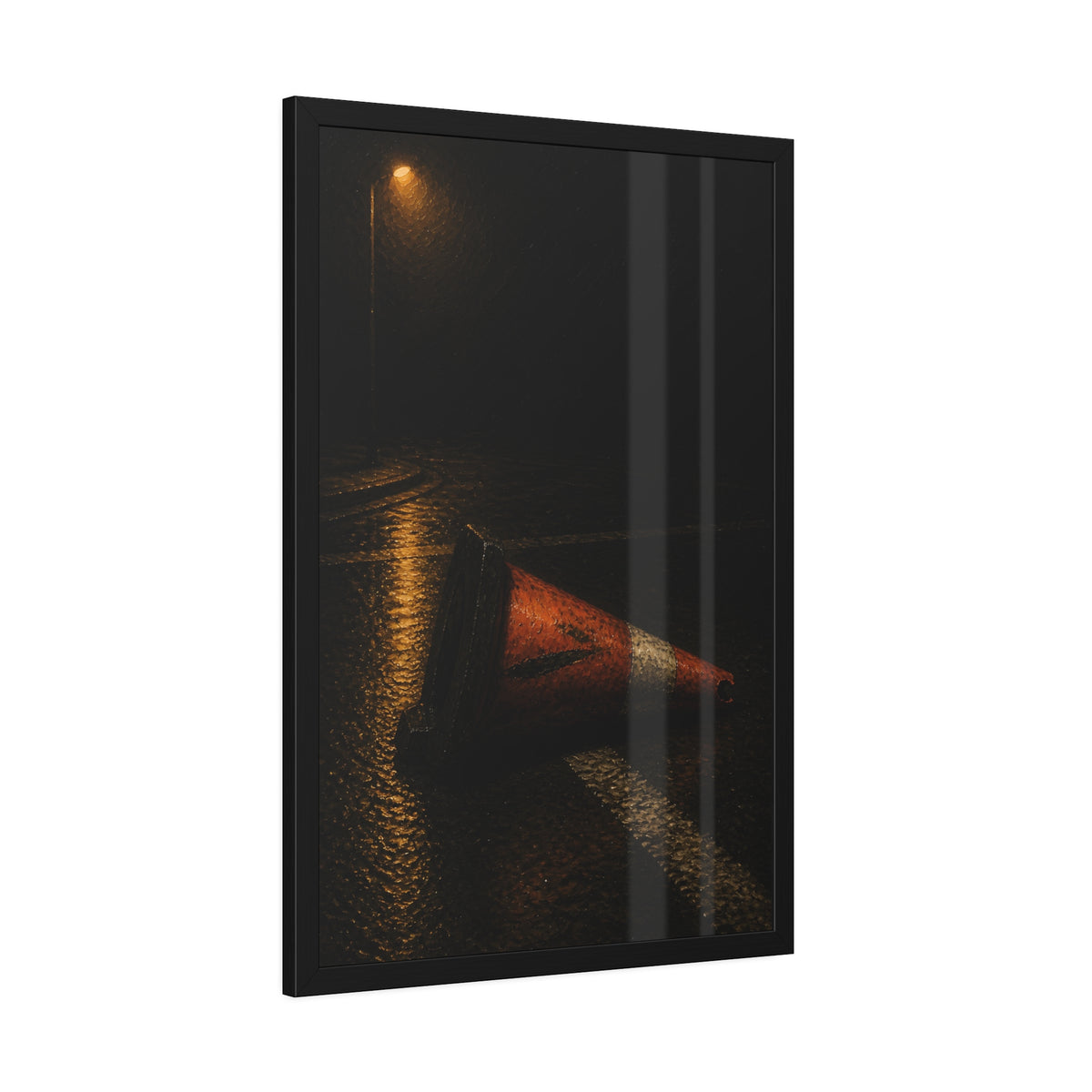 A toppled orange traffic cone on a wet road under a lone streetlight. The Taking by the Bumper by Garabaggio, framed fine art print hanging in a room.