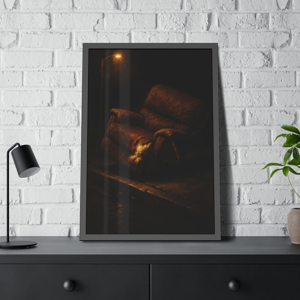 A torn brown recliner tipped on a curb in dim warm light. The Deposition of the Broken Recliner by Garabaggio, framed fine art print hanging in a room.