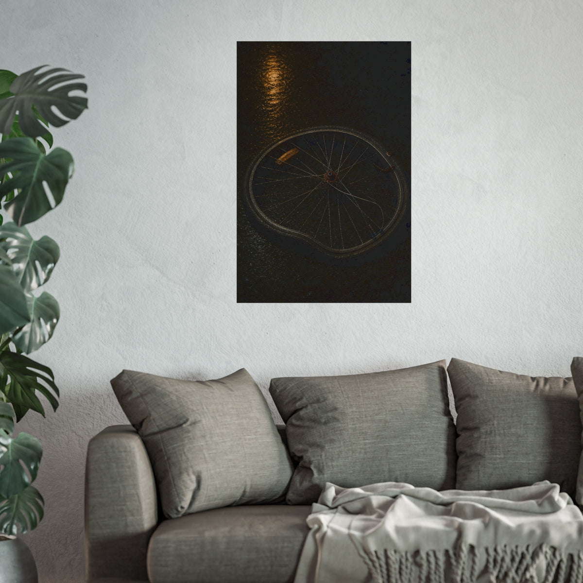 A buckled bicycle wheel on wet asphalt beneath a streetlight reflection. The Bend from Impact by Garabaggio, fine art print hanging in a room.
