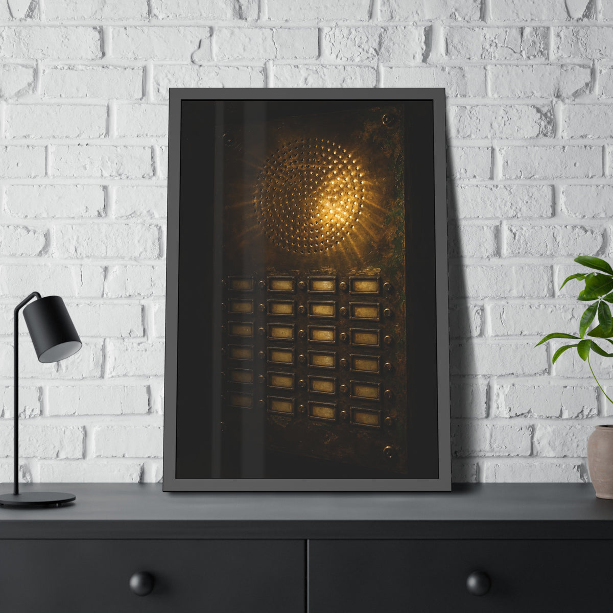 Light glowing through an intercom speaker grille above rows of buttons. Voice Through Perforations by Garabaggio, framed fine art print hanging in a room.