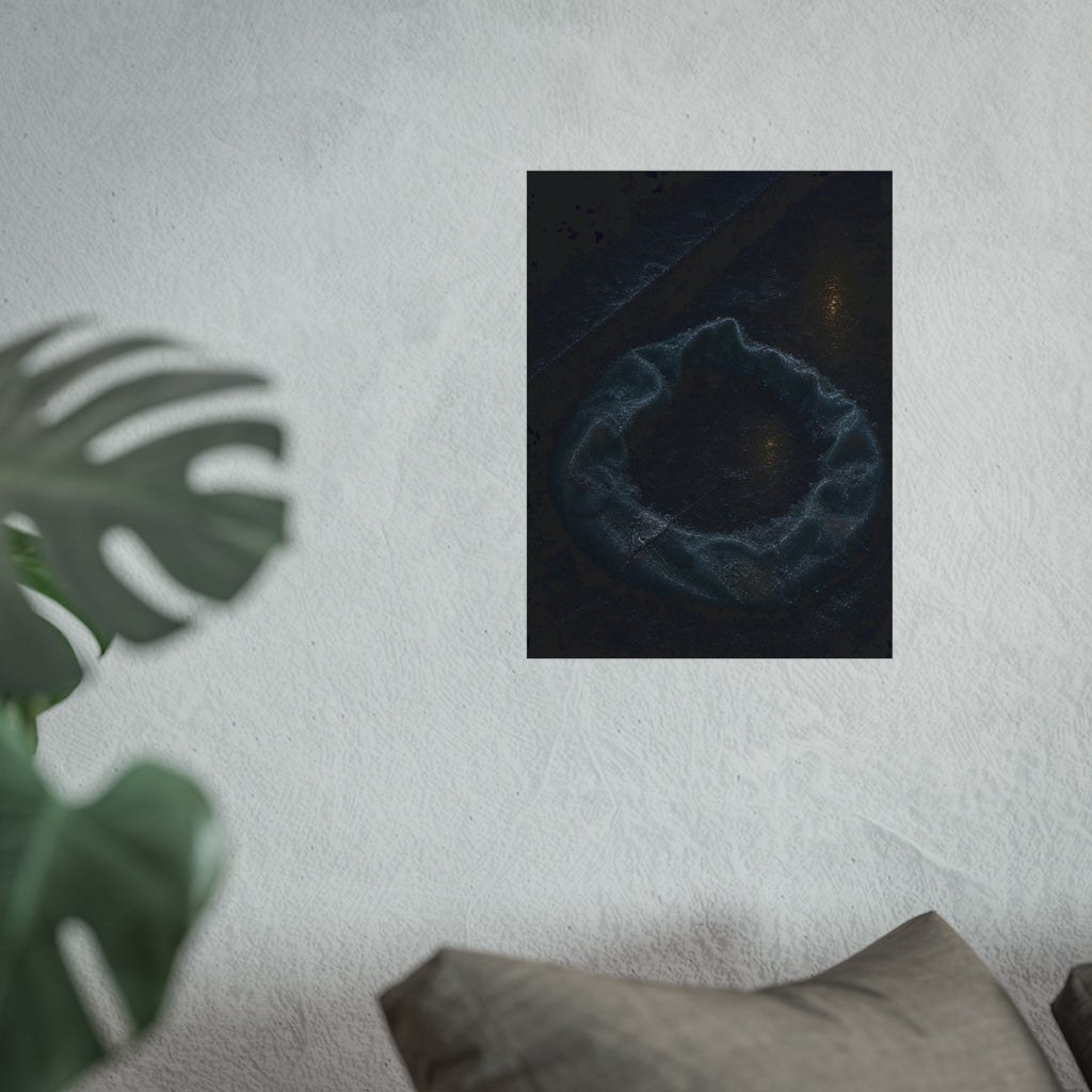 A deflated ring float collapsed on wet pavement under distant amber light. The Freezing of the Smile by Garabaggio, fine art print hanging in a room.