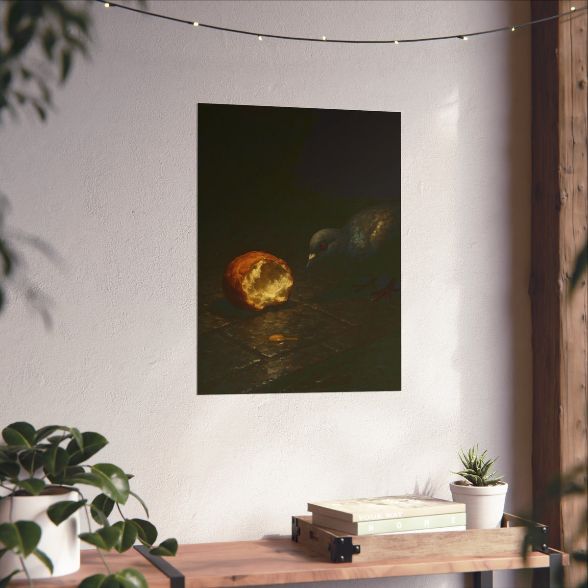 A pigeon leaning toward a torn bread roll on wet paving stones. The Offering of the Discarded Bun by Garabaggio, fine art print hanging in a room.