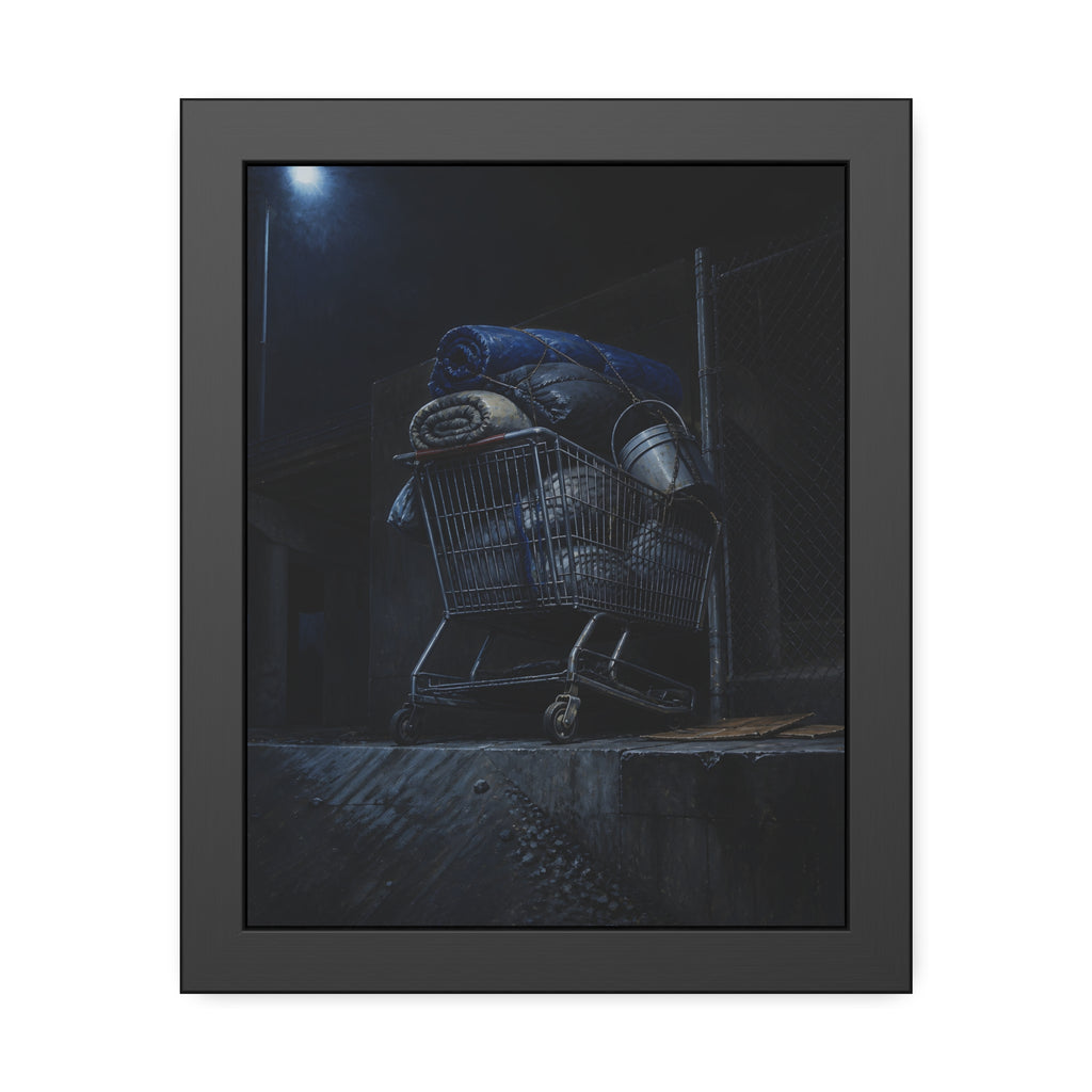 A shopping cart piled with bedding and buckets under a streetlamp. The Loading of Another Life by Garabaggio, framed fine art print, 11″ x 14″.